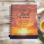 Spiral-bound end-of-life planner with an orange sunset cover reading “Fuck, I’m dead. Here’s all the shit you need to take care of.”