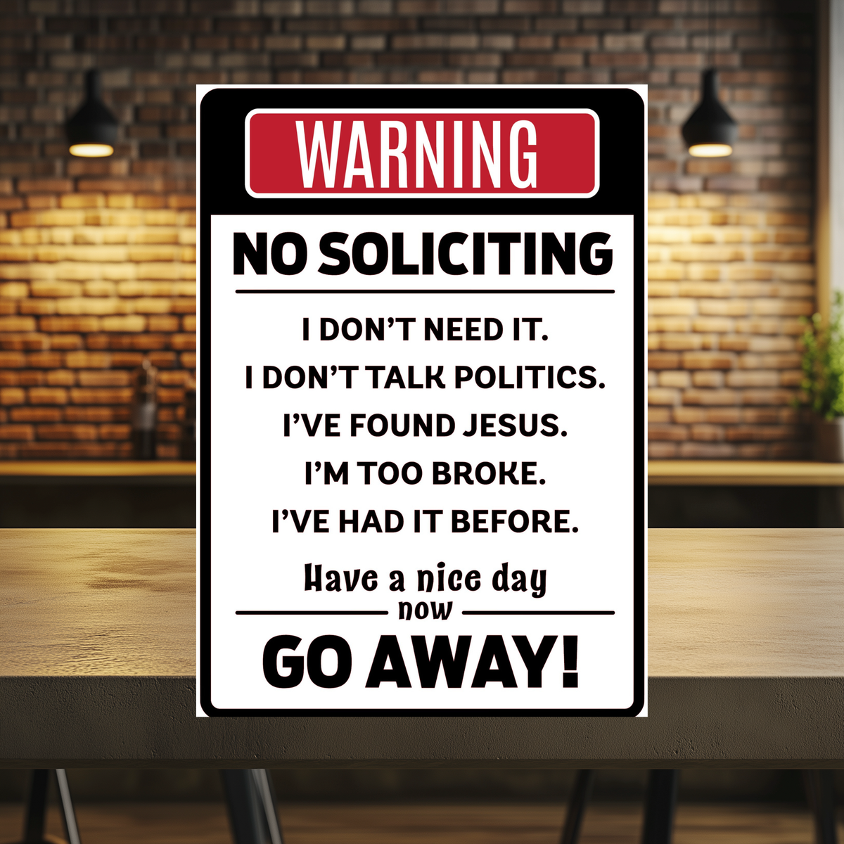 Black and white aluminum sign with a red “Warning” header, reading “No soliciting. I don’t need it. I don’t talk politics. I’ve found Jesus. I’m too broke. I’ve had it before. Have a nice day, now go away!”