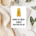 White rectangular card with a yellow “Caution Wet Floor” sign, reading “Thanks for all the orgasms, keep that shit up!”