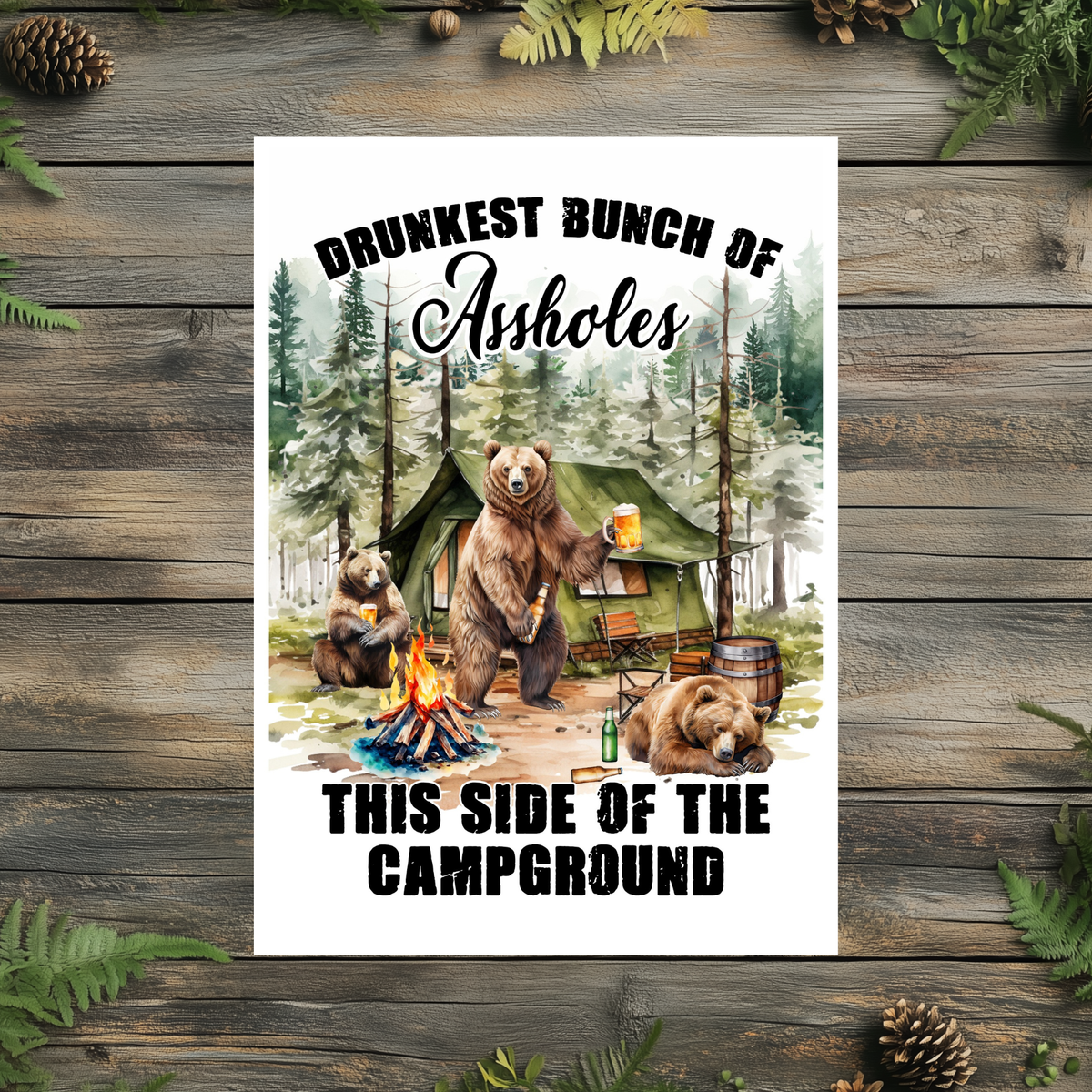 White aluminum sign with three bears, beer, a campfire and a tent in a forest, reading “Drunkest bunch of assholes this side of the campground.”