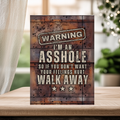 Rust-look aluminum sign with cream lettering and three stars, reading “Warning, I’m an asshole. So if you don’t want your feelings hurt, walk away.”