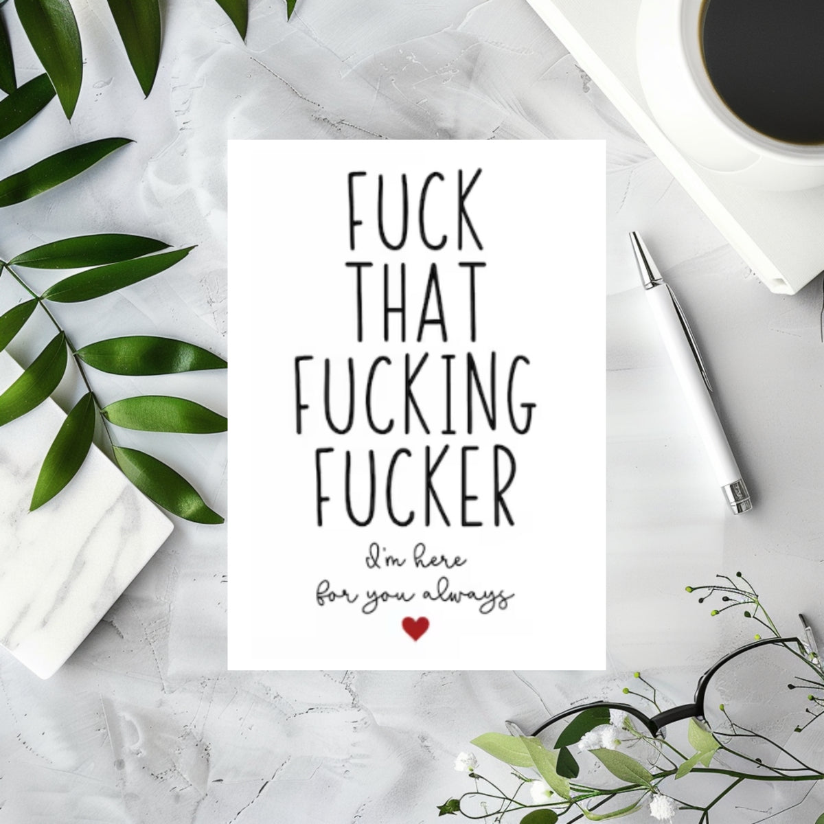 White rectangular greeting card reading “Fuck that fucking fucker” and “I’m here for you always,” with a small red heart.