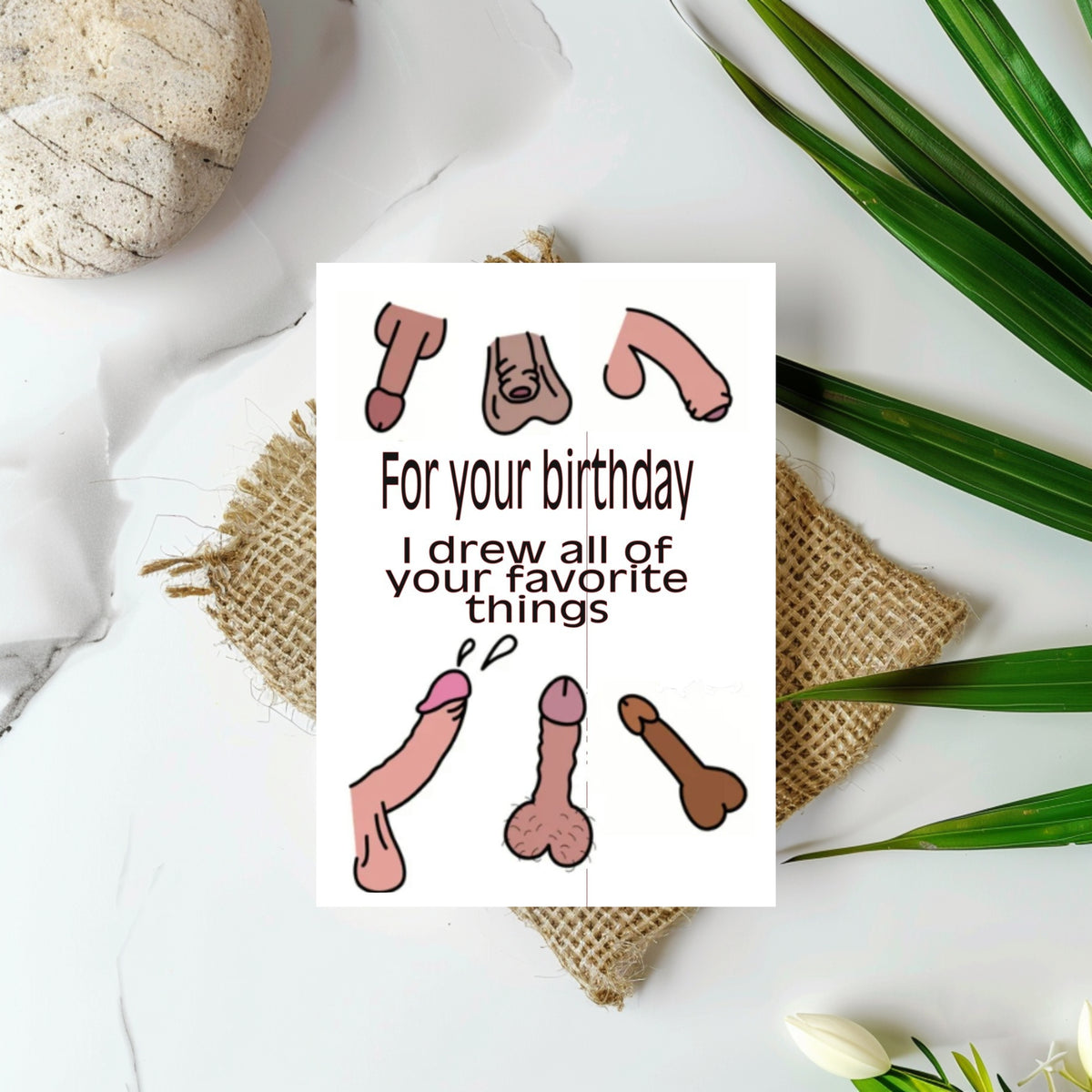 White rectangular birthday card with cartoon penises surrounding the words “For your birthday I drew all of your favorite things.”